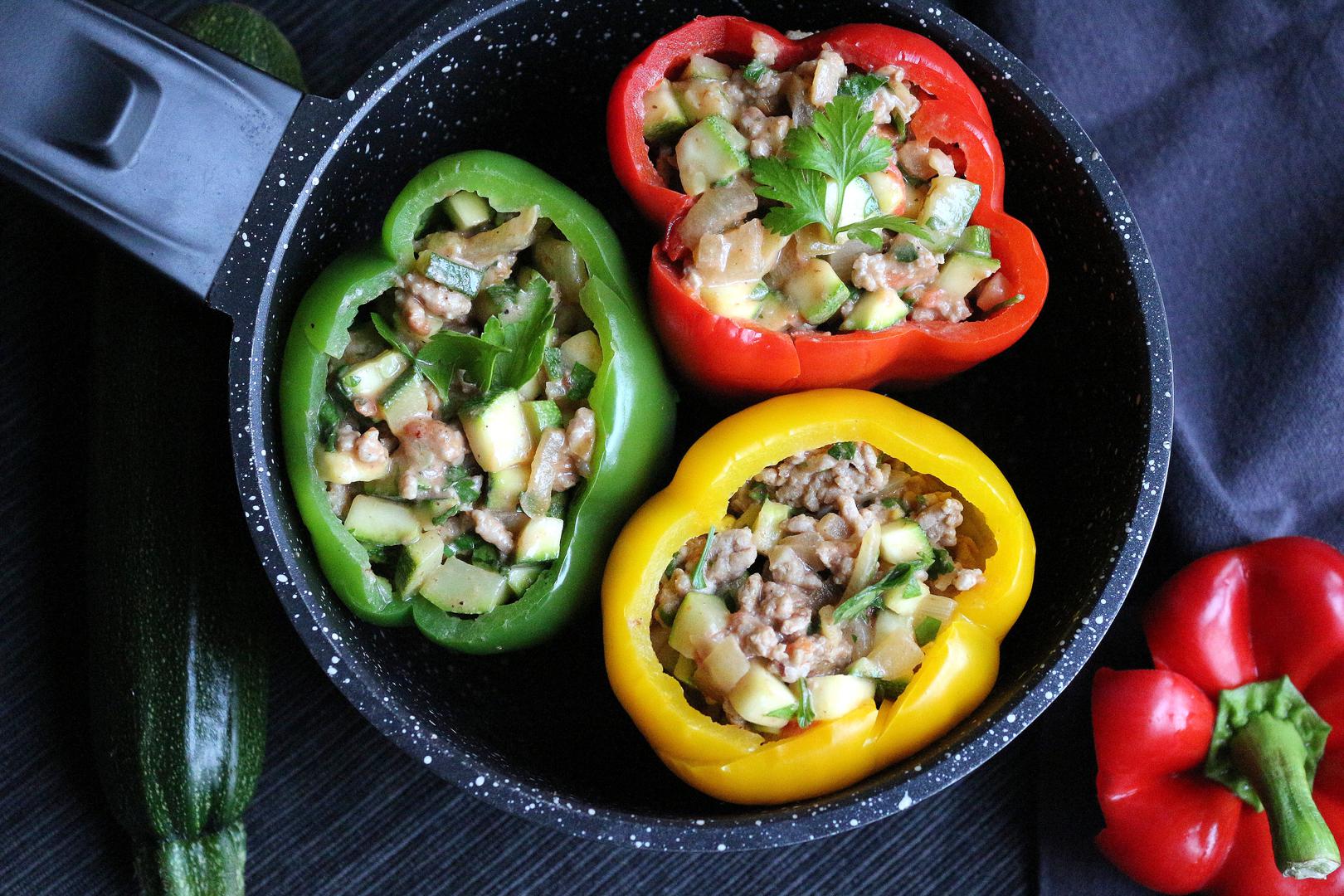 Sweet Peppers Stuffed With Pork And Courgettes And Sour Cream Sauce - 